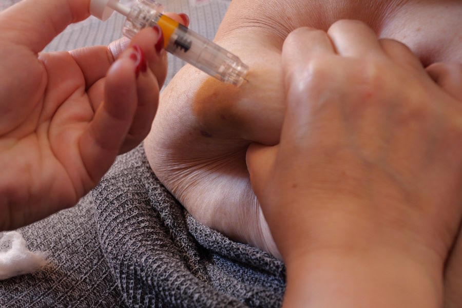 Doctor injecting GLP-1